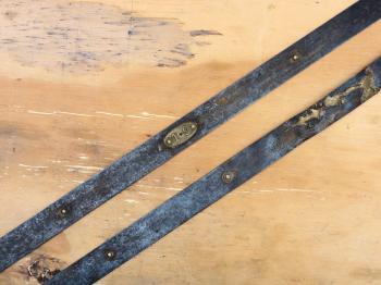 A section showing the various rivets and a whole metre plate. At the right one of the welds.