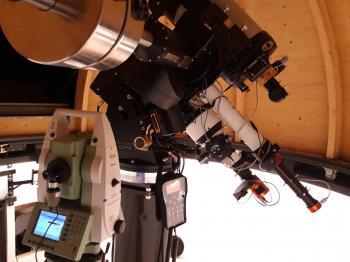 Auto-collimation setup on InFINNity Deck. The Leica measures on a first-surface mirror.